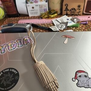 Portland Leather Beige Tassel Purse Charm.